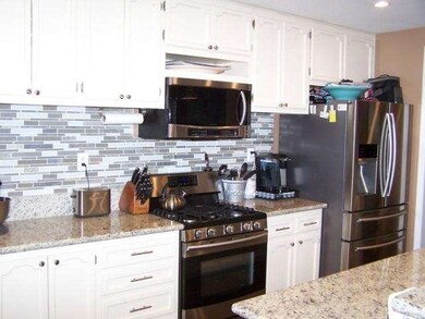 Spectacular kitchen with built -ins, granite count