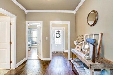 Reverse View of Foyer - Showing the entrance to the third bedroom.