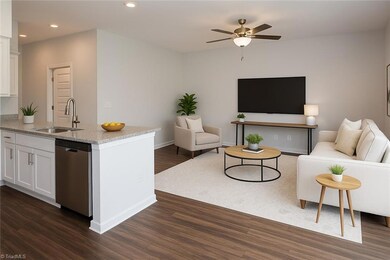 Dining to Kitchen to Den Virtually Staged