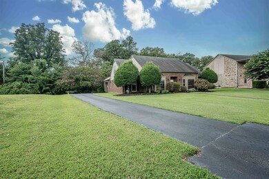 View of front of house featuring a front lawn