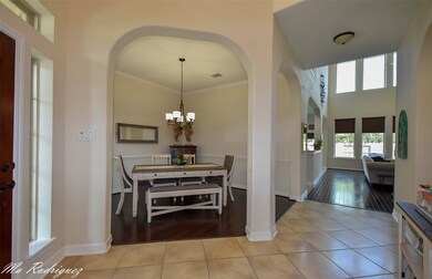 Spacious entrance with high ceilings.