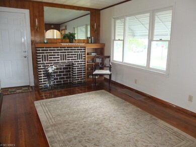 Living room with hardwood floor.