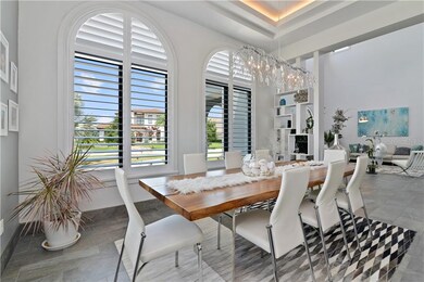 The formal dining room is open to the formal livin