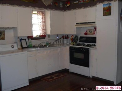 Kitchen with wood laminate floor