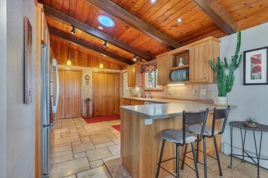 Kitchen window overlooks to backyard