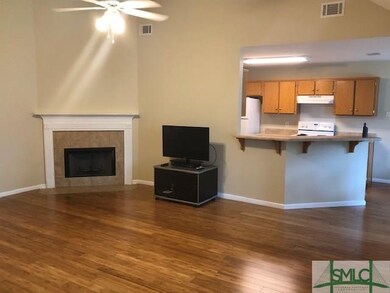Great room looking to kitchen
