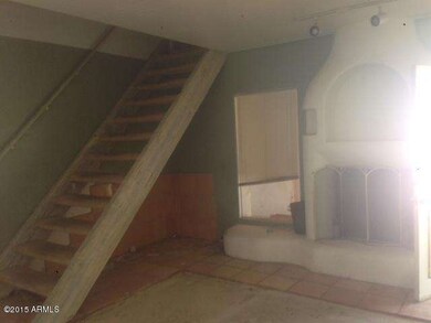 fireplace - stairs to 