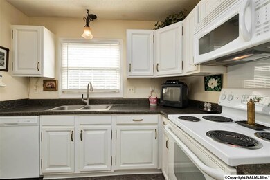 There is ample cabinet and counter space in the kitchen.  The dishwasher was installed new in 2017.