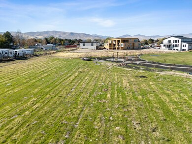View of yard with a mountain view and a view of rural / pastoral area