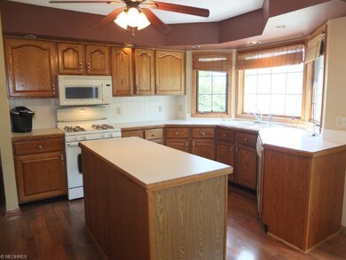 Kitchen has a nice center island and tons of count