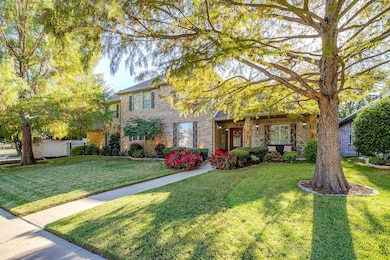 View of front of house featuring brick siding