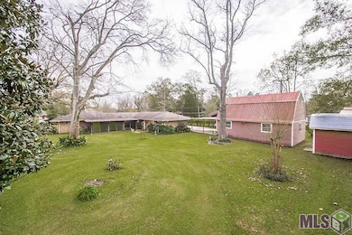 Expansive backyard boasts an exceptional WORKSHOP 