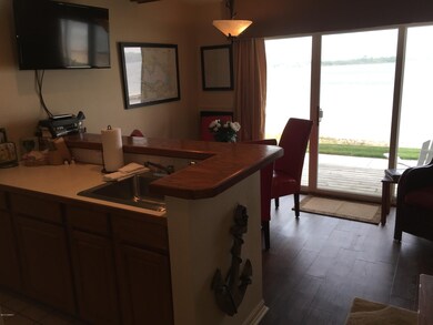 8567 Portage Point Dr unit T4, Onekama, MI 49675 - photo 5