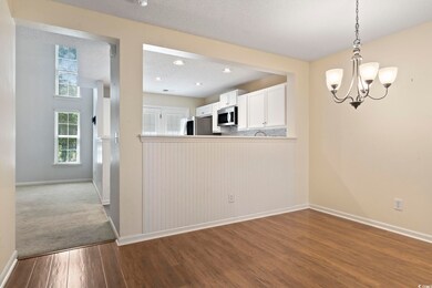 Interior space featuring an inviting chandelier an