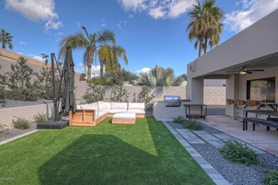 Exquisite backyard with green turf