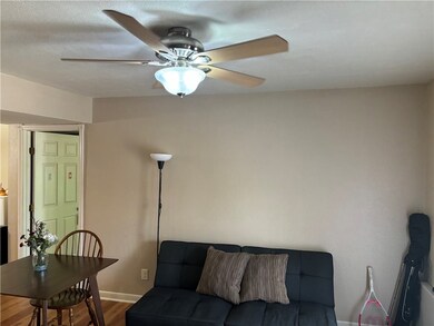 Living room featuring hardwood / wood-style floori