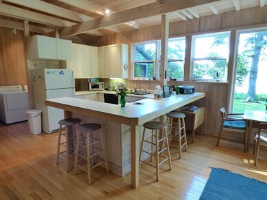 Kitchen with eat in area, laundry...