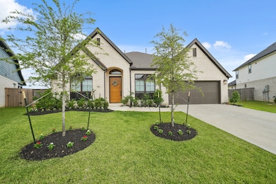 With it's full brick exterior, expansive front yar