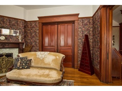Living Room with Pocket Doors to Dining Room