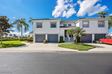 View of front of property featuring a garage and a