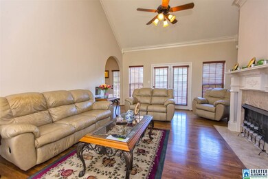 With fireplace, Hardwoods, and entrance to deck