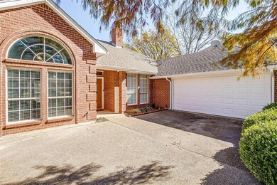 The two car garage and driveway allow for plenty o