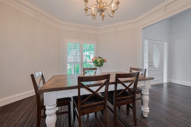 Spacious and inviting, this dining room easily acc