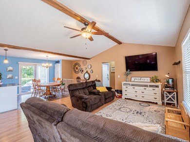 Vaulted Great Room with Wood Beam