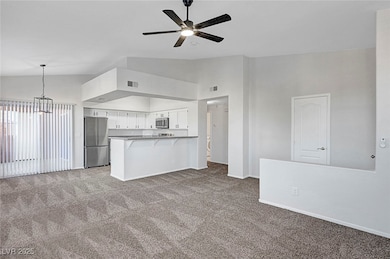 Kitchen featuring appliances with stainless steel
