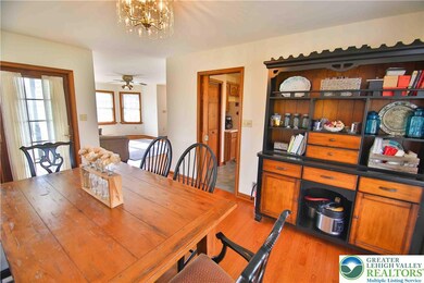 Pocket door offers separation from kitchen, if des
