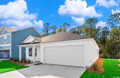 Ranch-style home featuring concrete driveway, an attached garage, a front yard, and roof with shingles