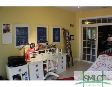 Sunroom. Owner uses sunroom as a office and a plac