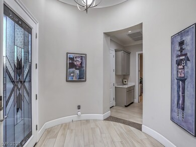 Foyer Entry, Hallway to second Bedroom & Bath