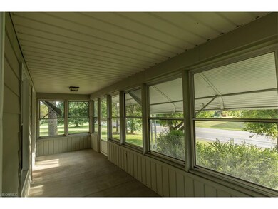 Wrap around enclosed front porch
