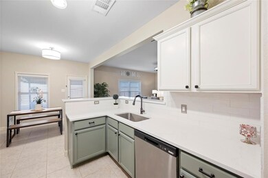 Under mount sink and stainless steel appliances.