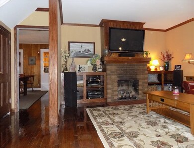 Living Room Opens To Foyer & Formal Dining Room
