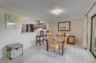 Oversized dining room with large pass through.