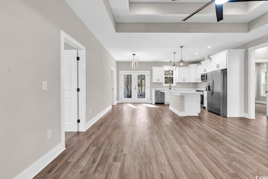 Kitchen with appliances with stainless steel finis