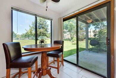 With Screen Doors that Open onto the Patio