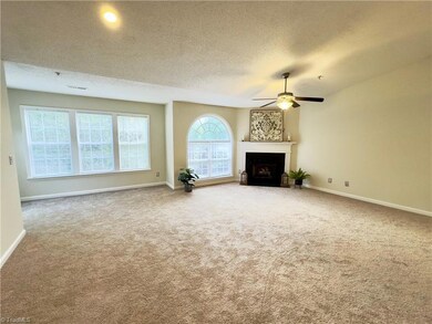 View of living and dining area from kitchen