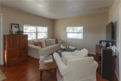 Family room with wood floors 