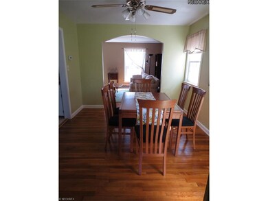 Formal Dining Room with Gleaming Hardwood Floors