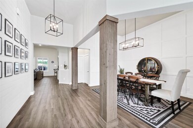 Accent ship-lap picture wall and formal dining. (chandeliers stay)
