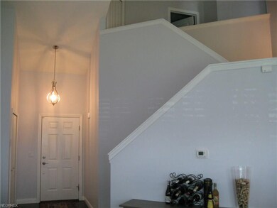 Foyer with vaulted ceiling