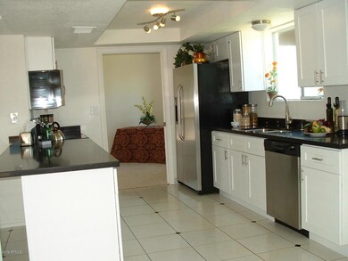 Kitchen open to D-Room Area