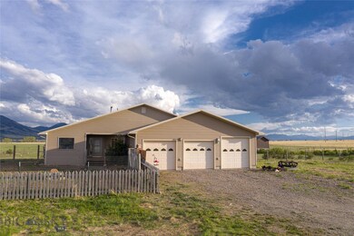 Front of the house with 3 car garage.