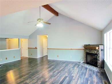 Living Room with vaulted living room, wood laminat