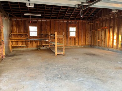 2 CAR GARAGE WITH INSULATED SHOP SPACE