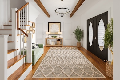 Inviting Entryway of main home with original hardw