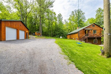 Long gravel driveway, with a turnaround and parkin